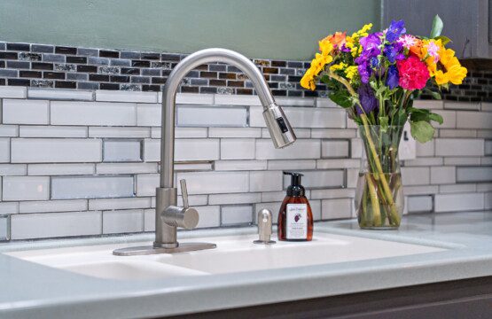 Thoughtful details and modern finishes create a bright, inviting space for meal prep and cleanup.