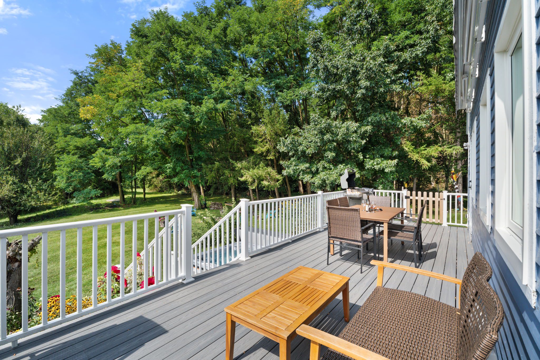 Room to dine, lounge, and soak up the sunshine—this deck makes outdoor living easy.