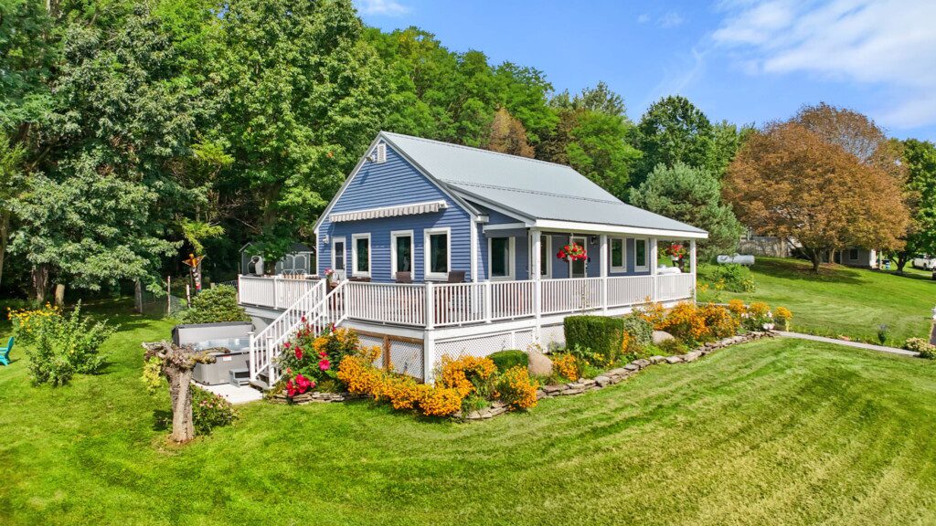 Surrounded by colorful gardens and green countryside, this charming retreat feels right at home in Wine Country.